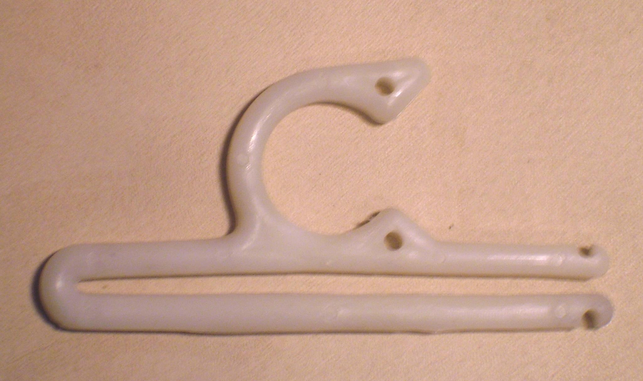 Injection molded hanger produced from a Delphi mold